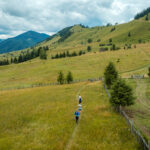 Bucovina Ultra Rocks by UTMB runners on hillside